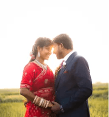 Modern South Asian couple in wedding attire