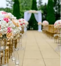 Outdoor wedding ceremony with a floral arch