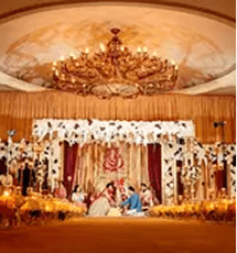 Elegant Sikh wedding ceremony under a floral mandap